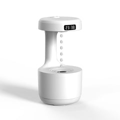 LED water drop humidifier diffuser with clock display and water droplet design for enhanced home ambiance.